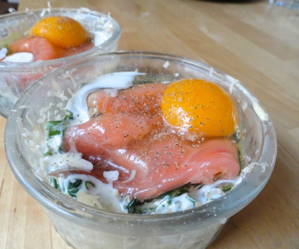 Preparing baked eggs and salmon